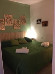 Ένα ή περισσότερα κρεβάτια σε δωμάτιο στο CASA NOAH