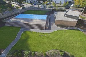 an overhead view of a park with a swimming pool at Parkvilla Mathilde - Luxus Penthouse 26 "Sea View" in Binz