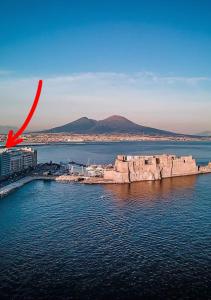 a large body of water with a red object in the water at Viromar in Naples