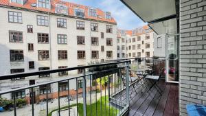 a balcony with a view of a building at ApartmentInCopenhagen Apartment 1563 in Copenhagen