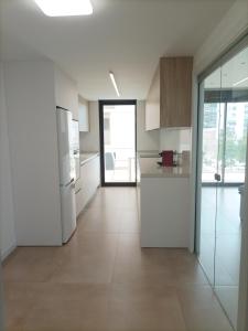 Kuchyň nebo kuchyňský kout v ubytování Residencial El Trenet 2A