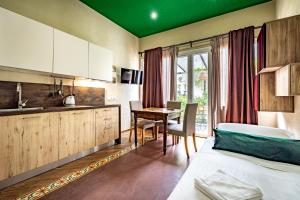 Kuchyňa alebo kuchynka v ubytovaní Roommo Apartments San Gallo