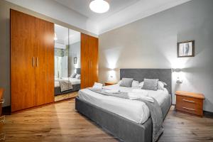 Posteľ alebo postele v izbe v ubytovaní Roommo Apartments San Gallo