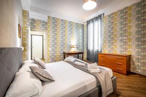Posteľ alebo postele v izbe v ubytovaní Roommo Apartments San Gallo