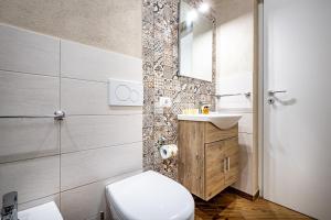 Kúpeľňa v ubytovaní Roommo Apartments San Gallo