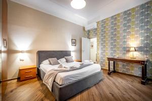 Posteľ alebo postele v izbe v ubytovaní Roommo Apartments San Gallo