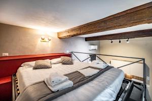 Posteľ alebo postele v izbe v ubytovaní Roommo Apartments San Gallo