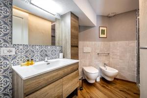 Kúpeľňa v ubytovaní Roommo Apartments San Gallo