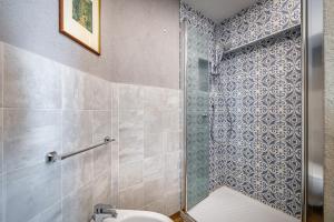 Kúpeľňa v ubytovaní Roommo Apartments San Gallo