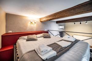 Posteľ alebo postele v izbe v ubytovaní Roommo Apartments San Gallo