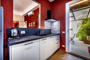 Kuchyňa alebo kuchynka v ubytovaní Roommo Apartments San Gallo