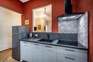 Kuchyňa alebo kuchynka v ubytovaní Roommo Apartments San Gallo