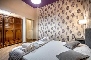 Posteľ alebo postele v izbe v ubytovaní Roommo Apartments San Gallo
