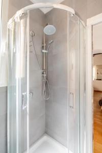 a shower with a glass enclosure in a bathroom at Domus Paolina in Rome