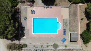 Fotografie z fotogalerie ubytování Casa Rosada - Piscina, aria condizionata, terrazze e posti auto v destinaci Marina di Campo
