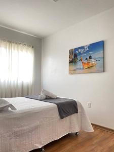 Ένα ή περισσότερα κρεβάτια σε δωμάτιο στο Apartamento Completo 2 Quartos com AC em Blumenau à 10min Vila Germânica, Tv a cabo e Premiere, ideal para família, Fácil acesso para Pomerode
