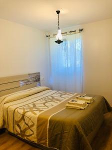 Postel nebo postele na pokoji v ubytování Apartamentos Zabalarena Artzaia
