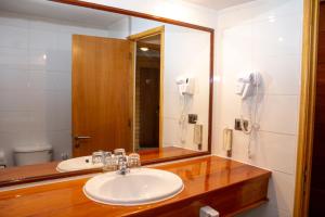 Koupelna v ubytování Hotel Germania + 34 fotografií
