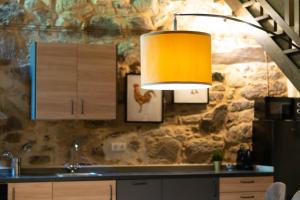 A kitchen or kitchenette at Ecolagar O Barqueiro Még 37 kép