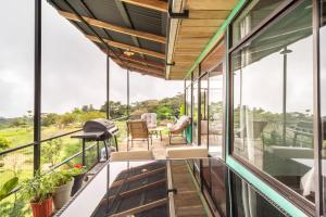 Balkón nebo terasa v ubytování Monteverde Ecolove