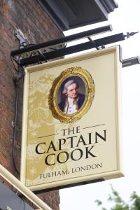 a sign on the side of a building at The Captain Cook in London