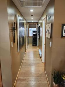a hallway leading to a room with a hallwayngthngthngthngthngthngthngth at 2 bed, 1.5 bath cottage across from Watauga Lake in Butler