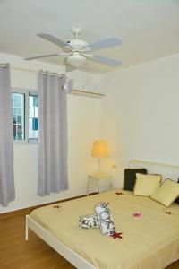 Ένα ή περισσότερα κρεβάτια σε δωμάτιο στο Vittoria House A-308