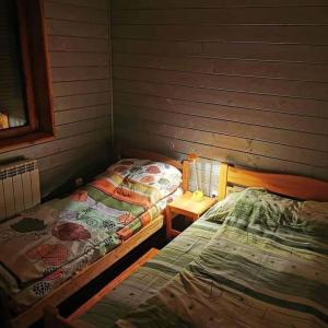 Ένα ή περισσότερα κρεβάτια σε δωμάτιο στο Vila Treska 98