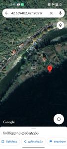 uma imagem de um mapa de uma praia com um marcador vermelho em Sofia's hotel 