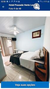 Tempat tidur dalam kamar di Hotel Pousada Vento Leste
