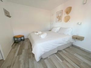 Postel nebo postele na pokoji v ubytování Eden Gomera Suites