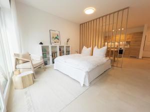 Postel nebo postele na pokoji v ubytování Design Apartment Alpenvorstadt