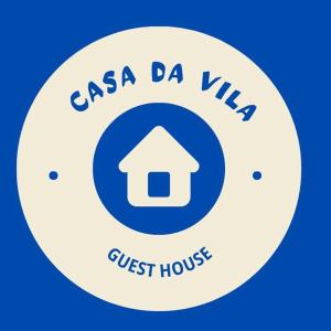a sign for the casa da vila guest house at Casa da Vila Hostel Guest House in Sao Paulo
