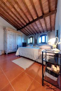 A bed or beds in a room at Casa Marylou