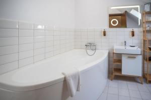 Koupelna v ubytování Opus Villa + 37 fotografií