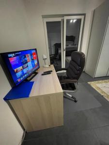 TV a/nebo společenská místnost v ubytování V.I.P Appartement