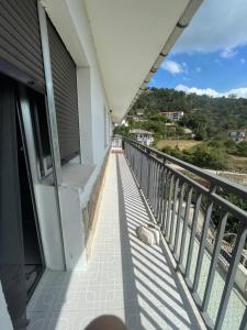 a balcony of a building with a view of the ocean at Casa El Real de San Vicente in El Real de San Vicente