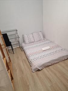 Posteľ alebo postele v izbe v ubytovaní Ian'Éliel Appart