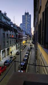 a view of a city street with cars parked at Porta Venezia Home in Milan