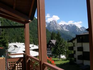 a view from a window of a mountain village at Residence Orsa Maggiore in Madonna di Campiglio