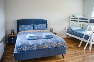 Ένα ή περισσότερα κρεβάτια σε δωμάτιο στο Cuilcagh Croft - Fermanagh Lakelands