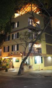 a large building with balconies on the side of it at Hotel Boutique Casa del Hidalgo in Cali