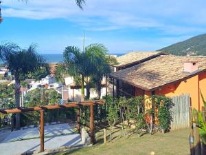 Casa con vistas al océano en Residencial Hibiscos - Vista Mar, en Garopaba