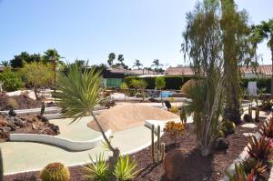 a resort with a pool and a skate park at Serenity Garden in Maspalomas