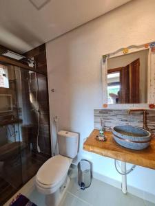 A bathroom at Casa do Lago Lapinha da Serra