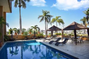 Бассейн в Hotel San Luis Lindavista или поблизости