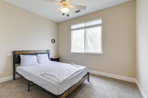 a bedroom with a bed and a window at Family-Friendly Manteca Vacation Rental with Pool! in Manteca +24 photos