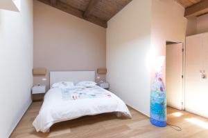 Säng eller sängar i ett rum på Agriturismo Castelli In Aria