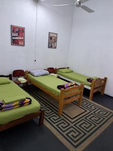 A bed or beds in a room at Amplia casa en Centro de la Ciudad