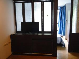 A television and/or entertainment centre at Apartment near Central phuket